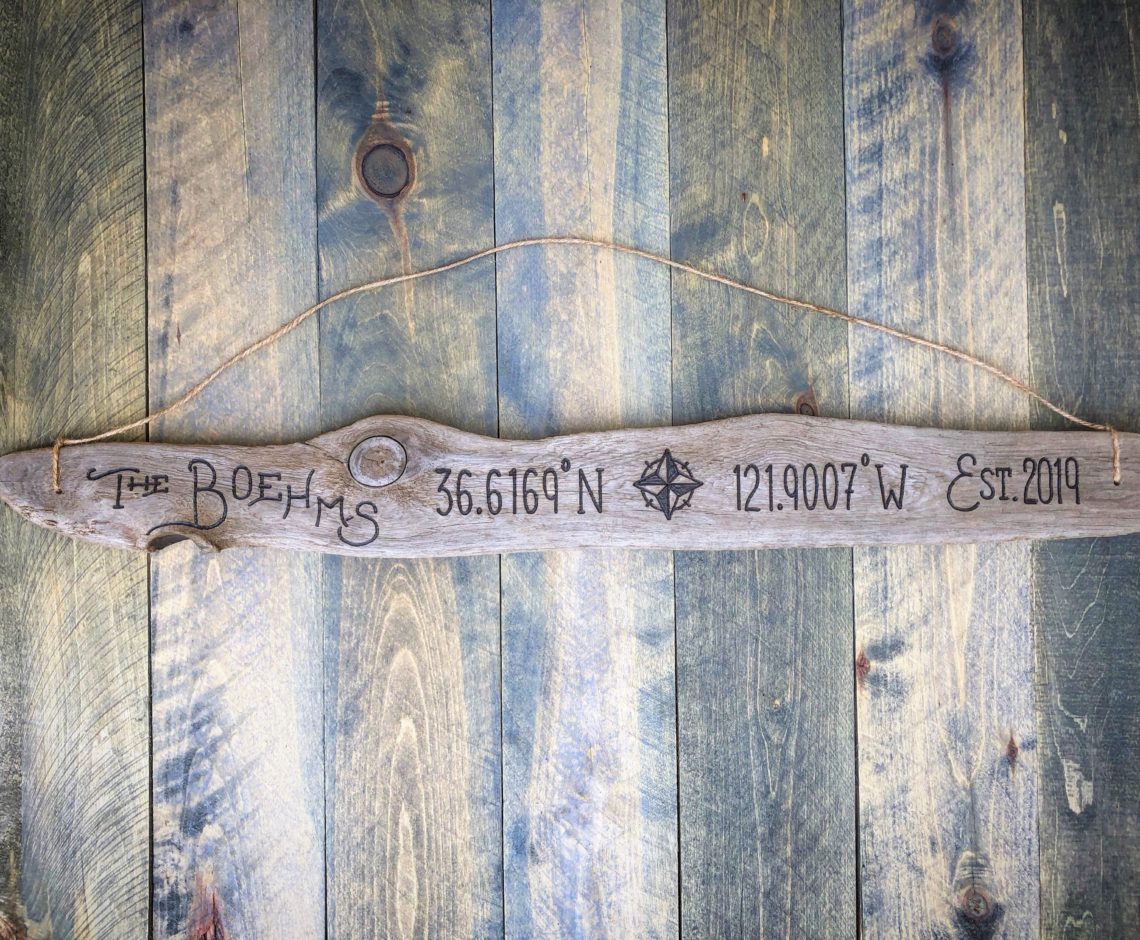 Driftwood Sign with family established date and coordinates