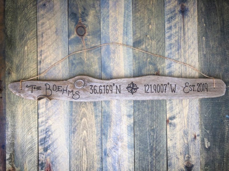 Driftwood Sign with family established date and coordinates